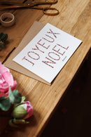 Cartolina di Natale fiorita