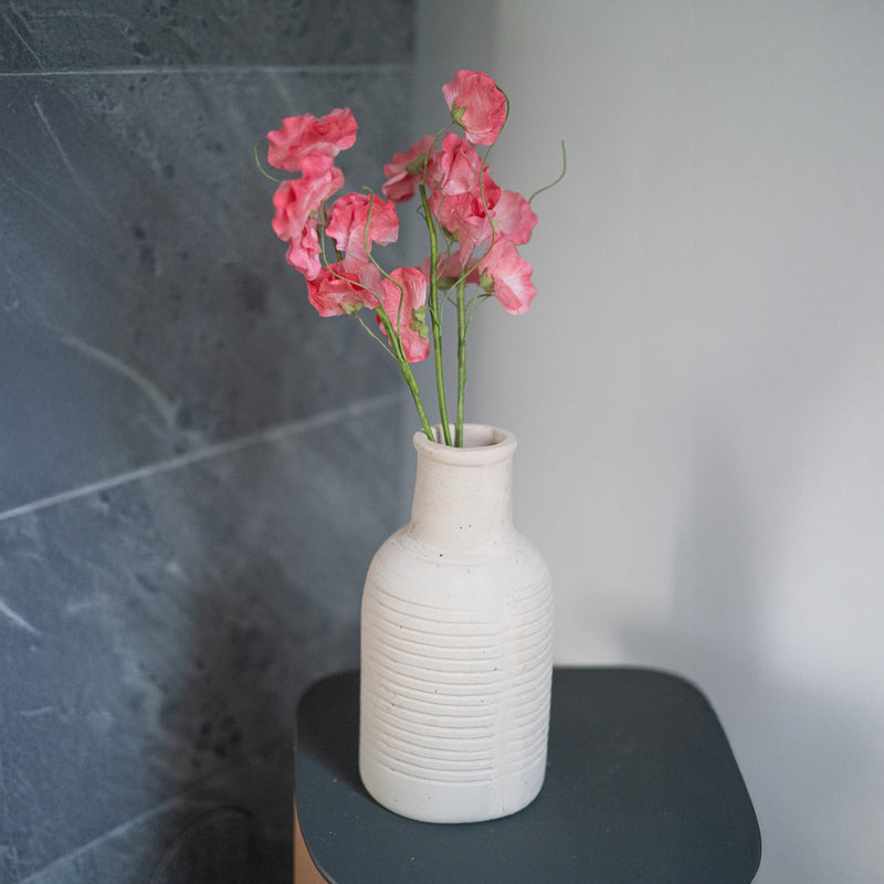 Piselli dolci in carta rosa scuro