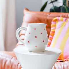 Brocca fiorita bianca e rosa